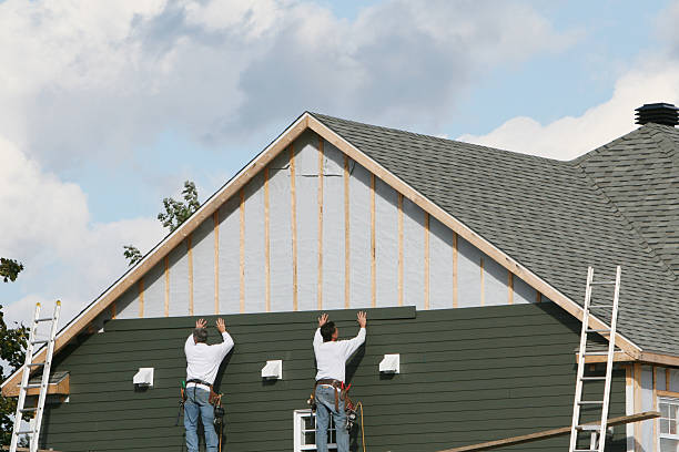Professional Siding Contractor technician working in Durham, CT